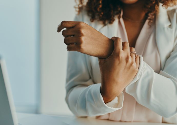 Woman with carpal tunnel syndrome wrist pain