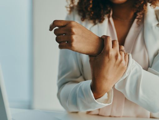 Woman with carpal tunnel syndrome wrist pain