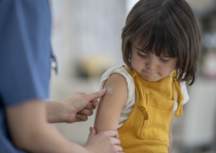 Girl getting vaccination