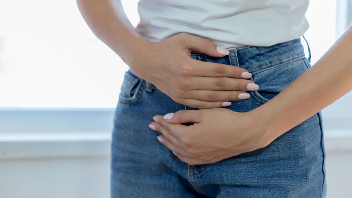 Woman holding her stomach