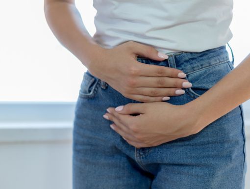 Woman holding her stomach