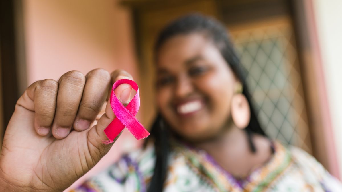 Woman with breast cancer ribbon