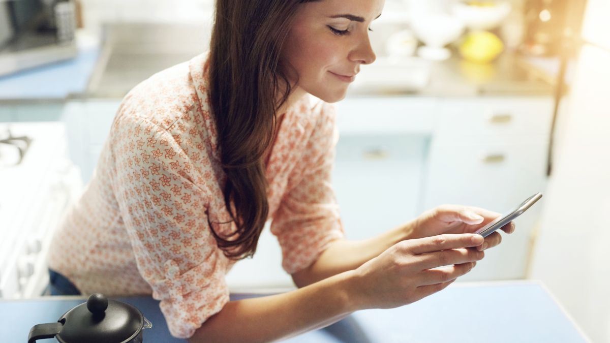 Young woman using phone