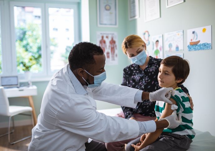 Boy getting shot at doctor
