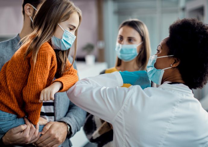 Girl with her primary care doctor