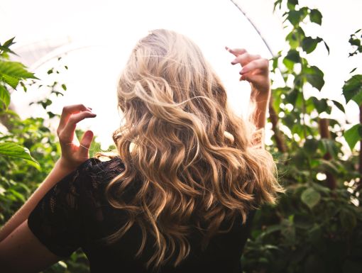 Blonde woman with long healthy hair