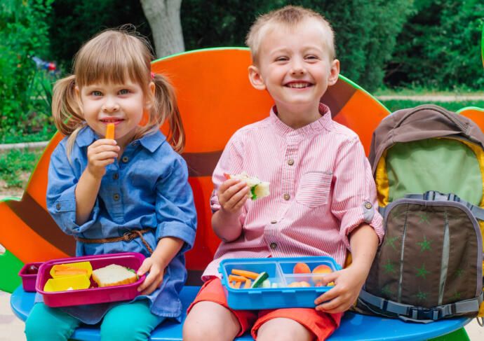 Children eating healthy lunchbox