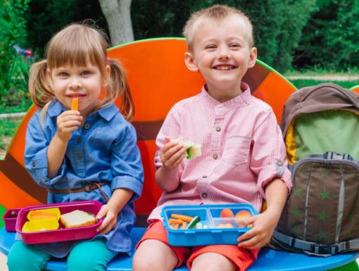 Children eating healthy lunchbox