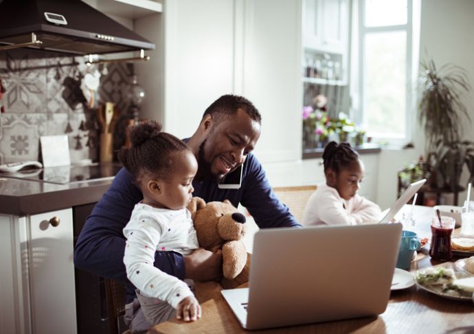 Dad juggling between children