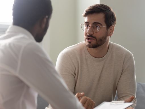 Man talking with his primary care doctor