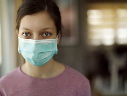 Teenage girl with mask
