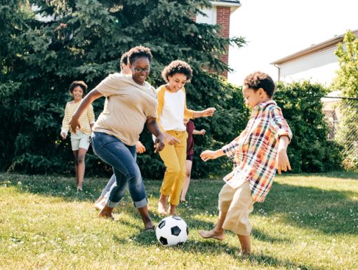 Children Exercising Soccer Running