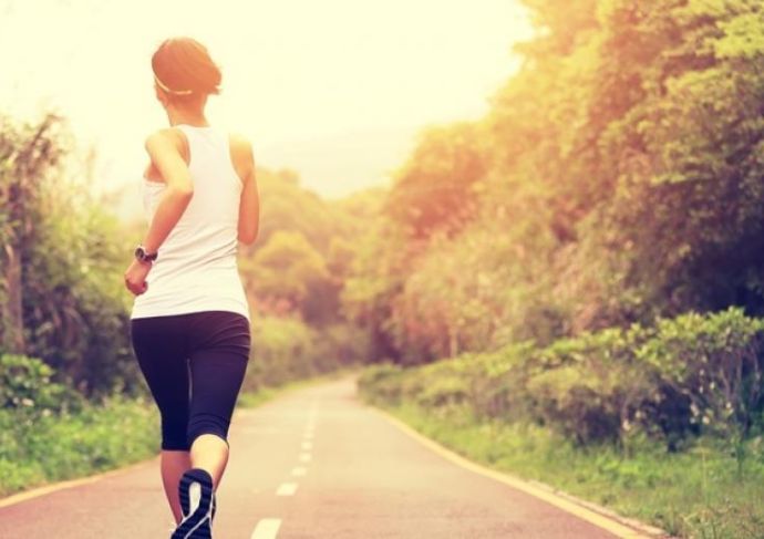 Thinkstock Photos 475360834 woman running on path