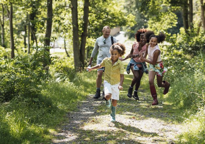 Family outside in the woods bug bites