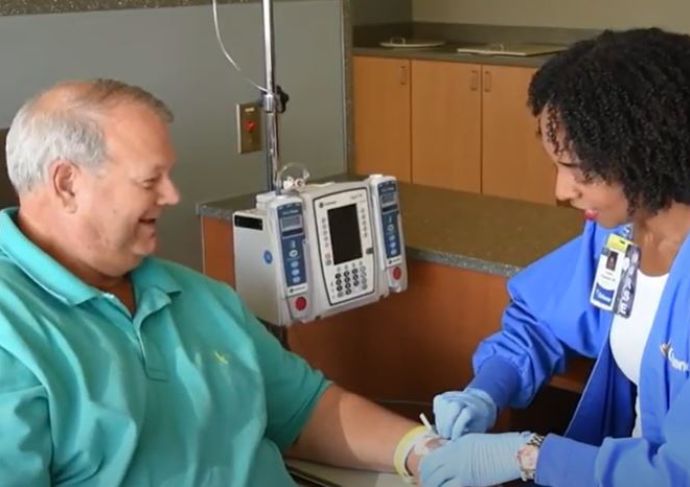 Man receiving chemo treatment