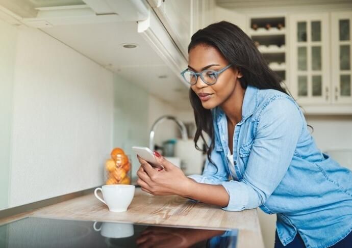 Woman researching on her phone 6