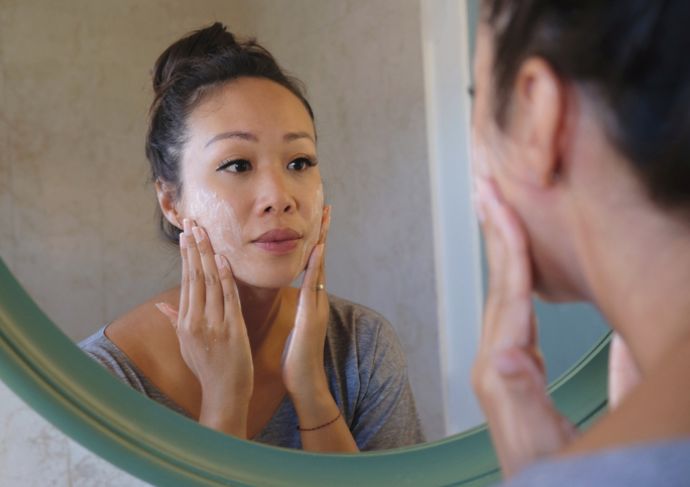 Woman looking in the mirror