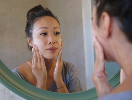 Woman looking in the mirror