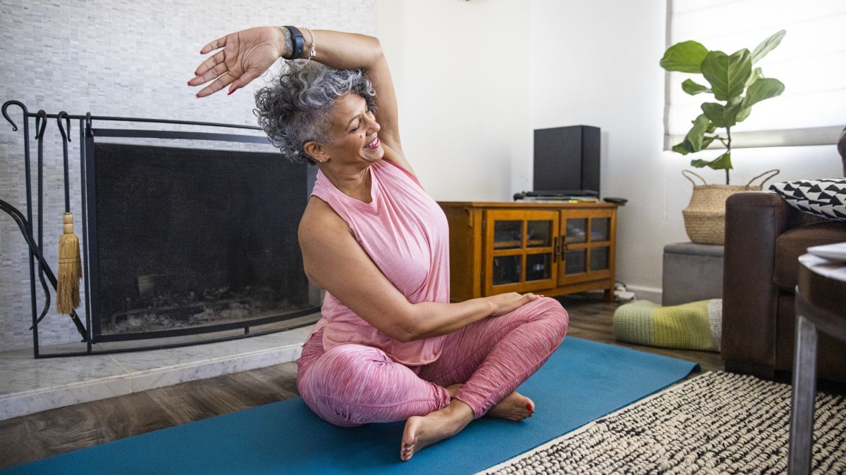 Older woman exercising at home
