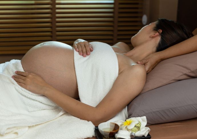 Pregnant woman getting a prenatal massage