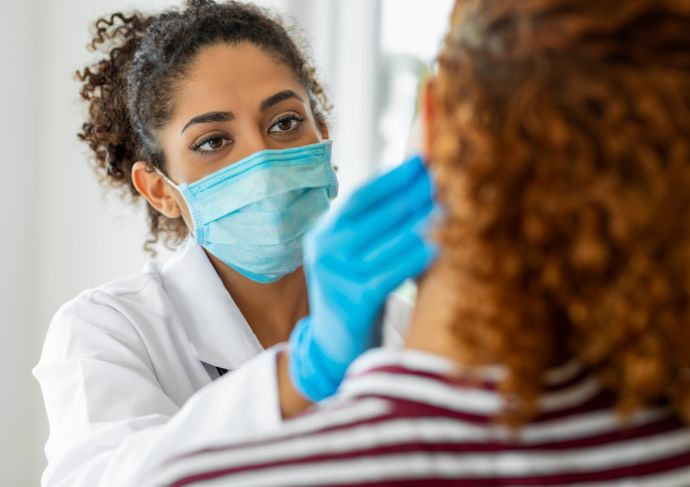 Physician examining patient monkeypox