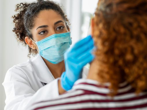 Physician examining patient monkeypox