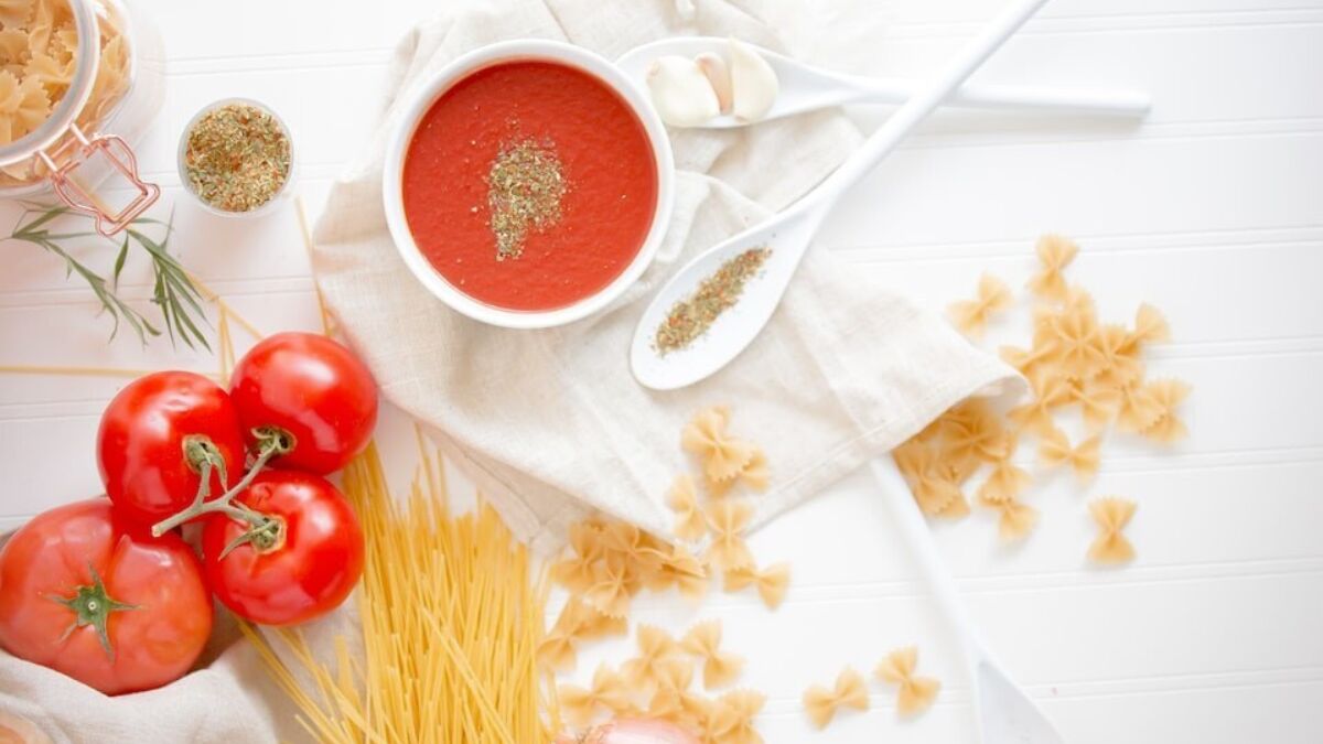 Homemade pasta sauce ingredients displaying on a table