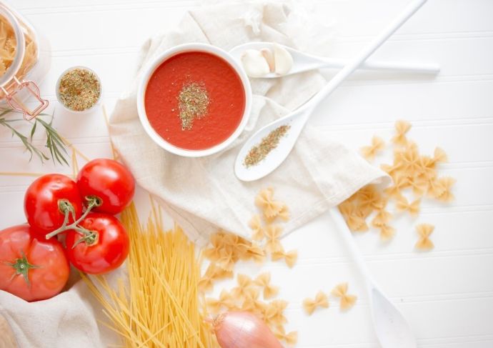 Homemade pasta sauce ingredients displaying on a table