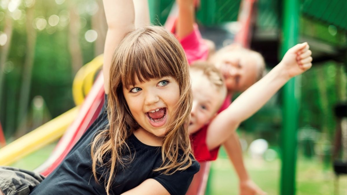 Thinkstockphotos 163216416 Kids Playing On Slide