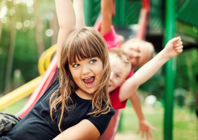 Thinkstockphotos 163216416 Kids Playing On Slide