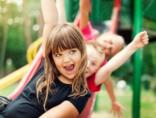 Thinkstockphotos 163216416 Kids Playing On Slide