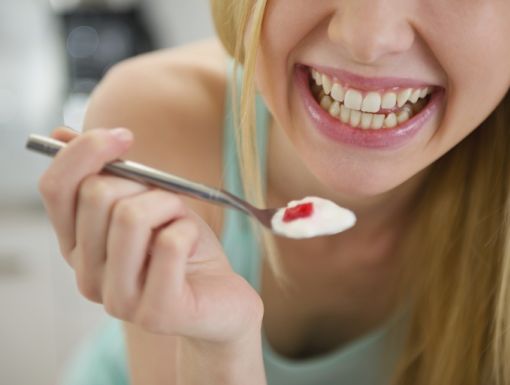 Thinkstockphotos 186912401 Girl Eating Yogurt