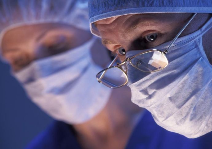 surgeon doing robotic surgery