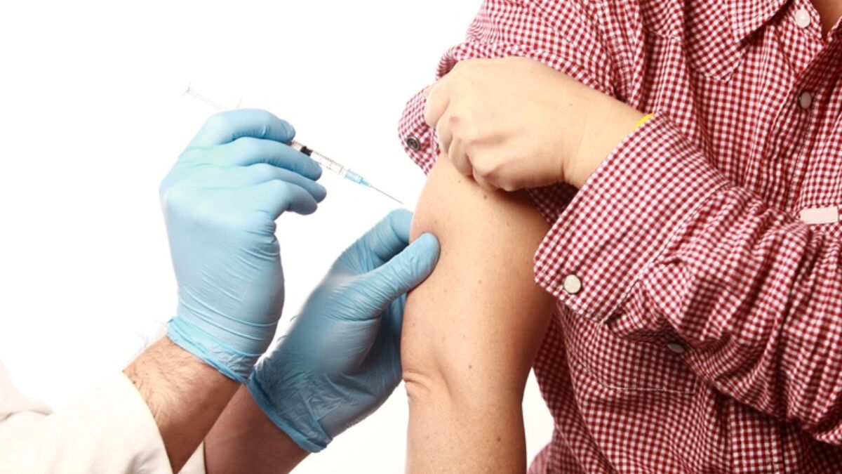 Patient-diabetes-getting-flu-shot-from-gloved-hands
