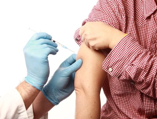 Patient-diabetes-getting-flu-shot-from-gloved-hands