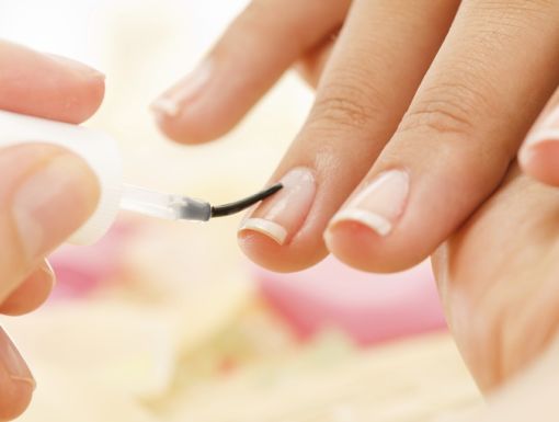 Woman painting her nails