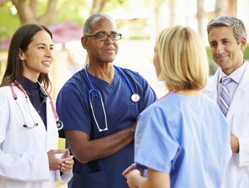 Thinkstockphotos 465134963 Medical Team Having Discussion Outside