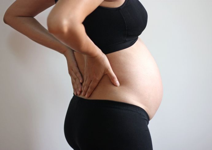 Thinkstockphotos 464711938 Pregnant Woman With Back Pain