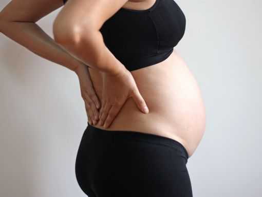 Thinkstockphotos 464711938 Pregnant Woman With Back Pain
