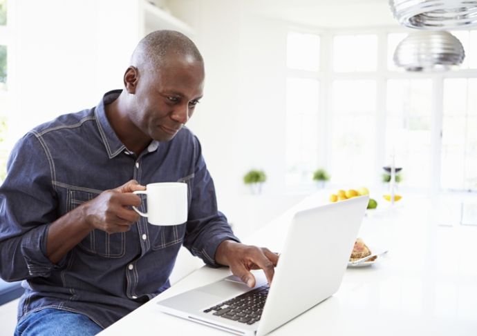 Thinkstockphotos 461259789 Man Using Laptop At Home