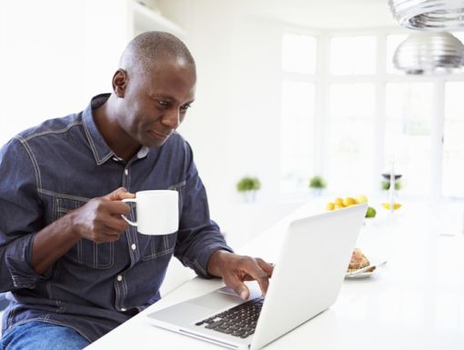Thinkstockphotos 461259789 Man Using Laptop At Home