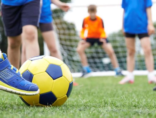 children playing soccer