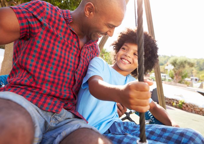 Man with epilepsy and child smiling