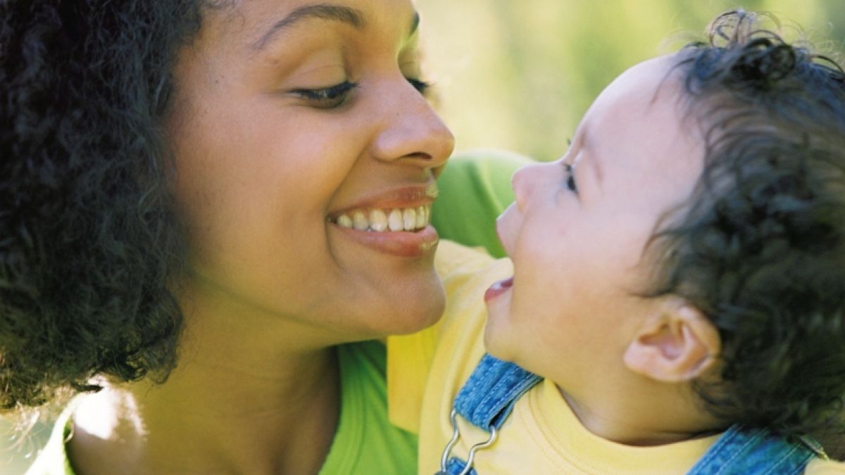 Mommy makeover candidate with her son