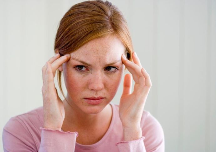 Female patient with headache pain