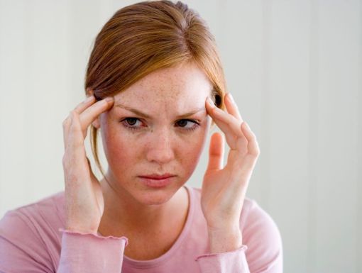 Female patient with headache pain