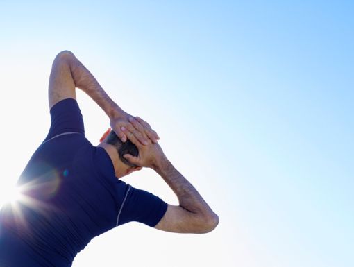 Thinkstockphotos 82090255 Man Outdoors Stretching