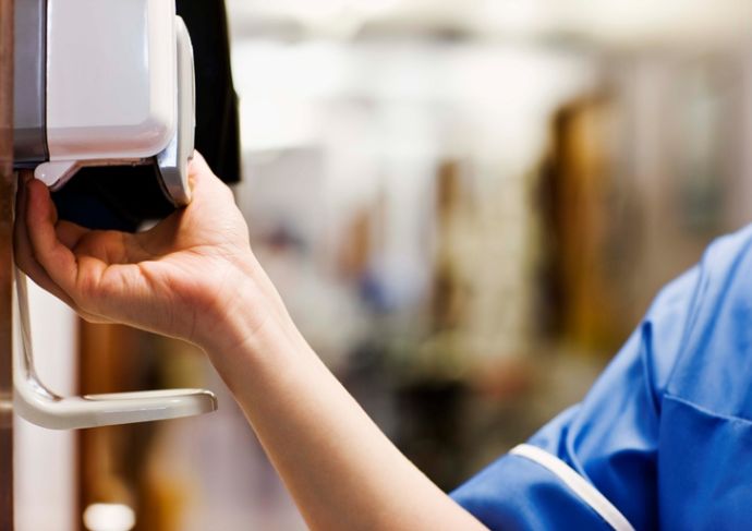 Thinkstockphotos 86509844 Nurse Using Hand Sanitizer