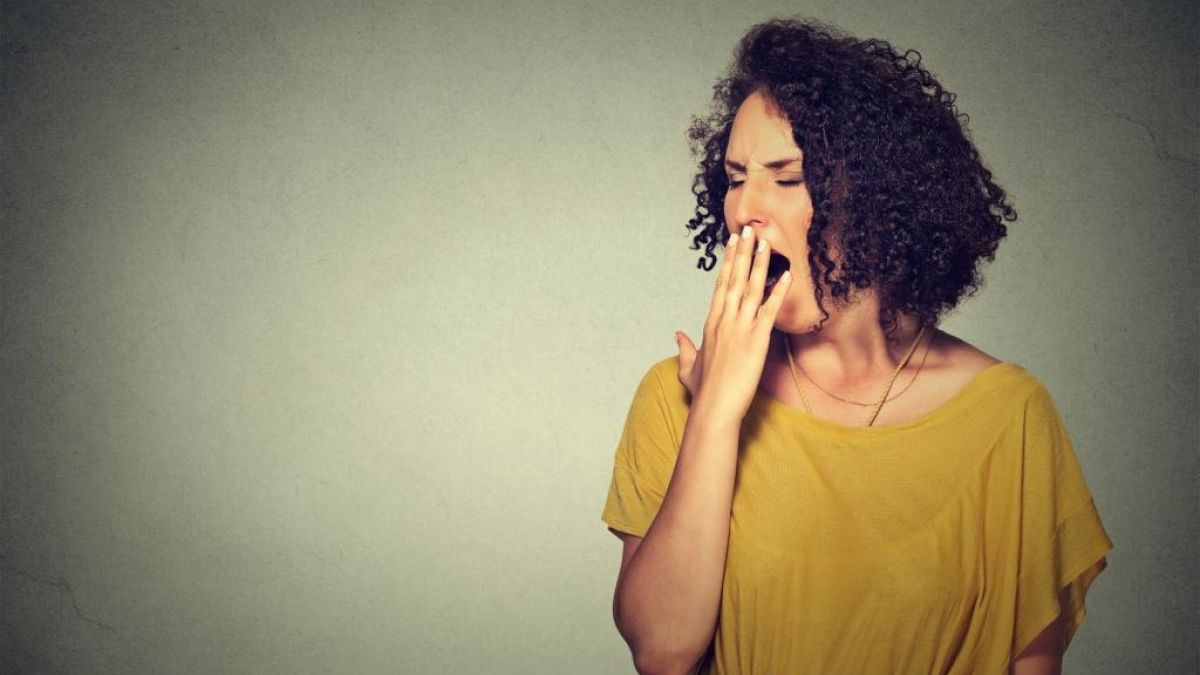 Woman Yawning
