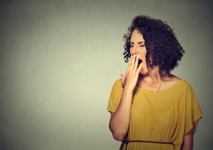 Woman Yawning